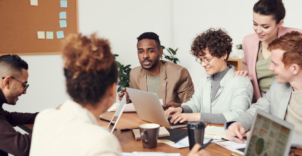 Professionals gathered around a conference table